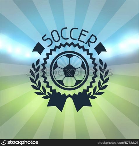 Sports label with soccer symbols on blurred stadium background.
