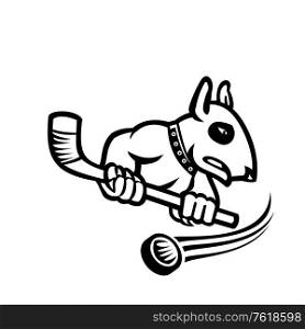 Sports mascot black and white illustration of a bull terrier or wedge head holding an ice hockey stick with puck at back viewed from side on isolated background in retro style.. Bull Terrier With Ice Hockey Stick Mascot Black and White