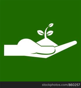 Sprout in the human hand in simple style isolated on white background vector illustration. Sprout in the human hand icon green