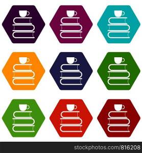 Stack of books and white cup icon set many color hexahedron isolated on white vector illustration. Stack of books and white cup icon set color hexahedron