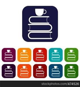 Stack of books and white cup icons set vector illustration in flat style In colors red, blue, green and other. Stack of books and white cup icons set