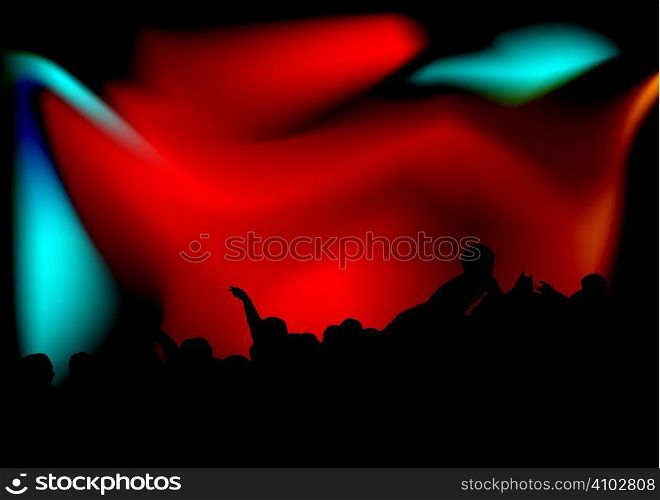 stage diving at a concert with the crowd in silhouette and bright spot lights