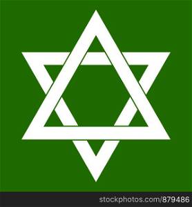 Star of David icon white isolated on green background. Vector illustration. Star of David icon green