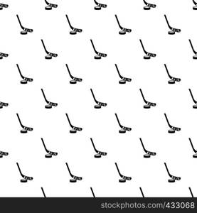 Stick and puck pattern seamless in simple style vector illustration. Stick and puck pattern vector