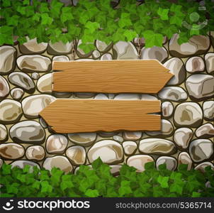 Stone wall with two wooden arrows and leaves