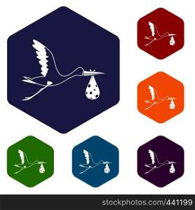 Stork carrying icons set hexagon isolated vector illustration. Stork carrying icons set hexagon