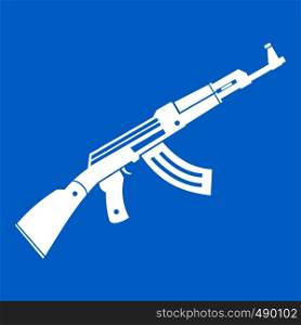Submachine gun icon white isolated on blue background vector illustration. Submachine gun icon white