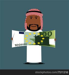 Successful wealthy arabian businessman in national white thobe and keffiyeh with one hundred euro bill in hands. Finance, success, wealth or abundance business concept . Arabian businessman with one hundred euro bill