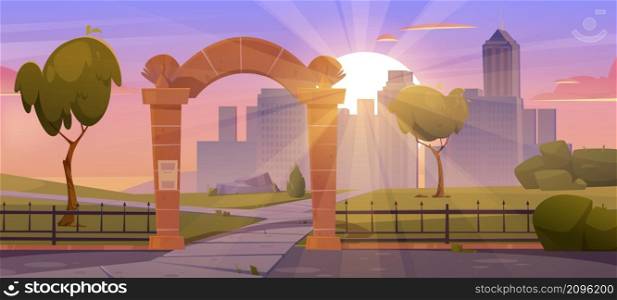 Summer landscape with stone arch entrance to public park, metal fence, green grass and trees at sunset. Vector cartoon illustration of city garden with archway portal, sun and buildings on skyline. Landscape with stone arch in city park at sunset