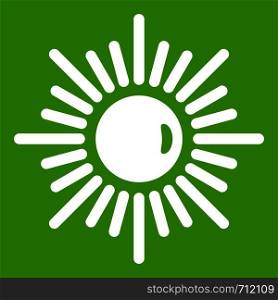 Sun icon white isolated on green background. Vector illustration. Sun icon green