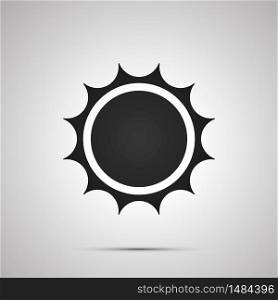 Sun with spiny rays, simple black icon with shadow. Sun with spiny rays, simple black icon with shadow on gray