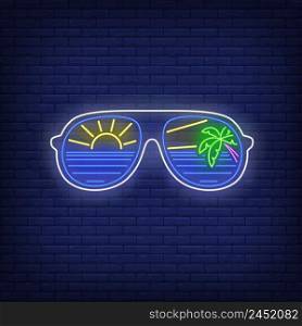 Sunglasses with sea, sun and palm tree reflection neon sign. Tourism, vacation, travel, summer design. Night bright neon sign, colorful billboard, light banner. Vector illustration in neon style.