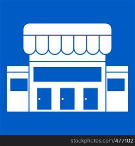 Supermarket building icon white isolated on blue background vector illustration. Supermarket building icon white
