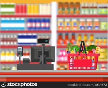 Supermarket interior. Cashier counter workplace. Shopping basket with food and drinks. Shelves with products. Cash register, pos terminal and keypad. Vector illustration in flat style. Supermarket interior. Cashier counter workplace.