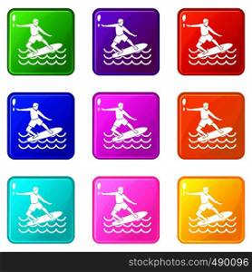 Surfer man icons of 9 color set isolated vector illustration. Surfer set 9