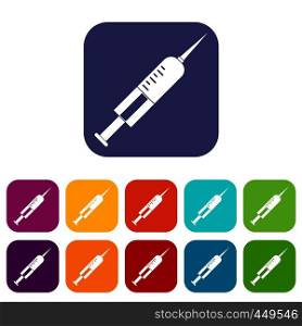 Syringe with needle icons set vector illustration in flat style In colors red, blue, green and other. Syringe with needle icons set flat