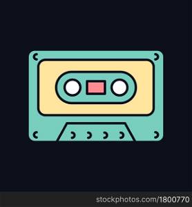 Tape cassette RGB color icon for dark theme. Music storage. Vintage technology. Collecting audiotapes. Isolated vector illustration on night mode background. Simple filled line drawing on black. Tape cassette RGB color icon for dark theme