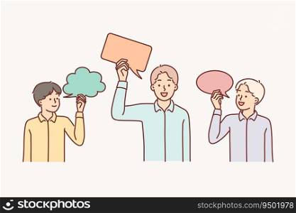 Teenage boys are holding speech bubbles symbolizing communication with friends or children imagination and ideas. Schoolboys with speech clouds above heads as metaphor for networking. Teenage boys are holding speech bubbles symbolizing communication or children imagination