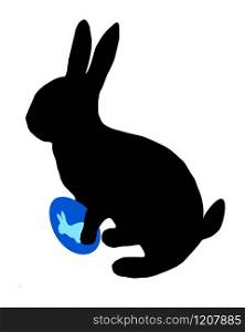 The black silhouette of a easter bunny with easter egg