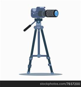 The camera on the tripod professional static shooting. A neutral background. The equipment of the photographer. camera tripod static professional photography