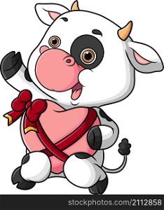 The cute cow is performing and holding a big heart love