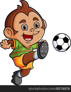 The cute monkey is running and kicking the soccer 