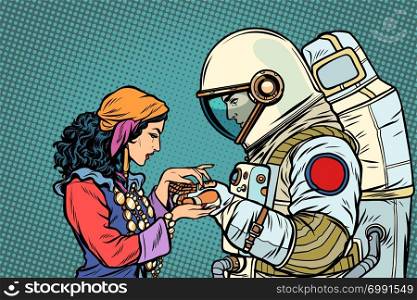 The fortune teller, and an astronaut. Palmistry by hand. Pop art retro vector illustration vintage kitsch. The fortune teller, and an astronaut. Palmistry by hand