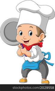 The funny chef is holding a frying pan