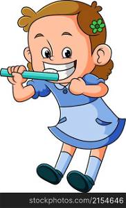 The girl is gesturing how to clean the teeth with the toothbrush