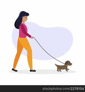 The girl went out with the dog for a walk. A woman walks a puppy on a leash.