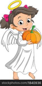 The girl with the angel costume is holding the pumpkin