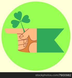 The hand indicates the direction of the green Patricks day holiday Shamrock Irish