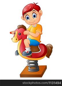 The happy child on a toy horse