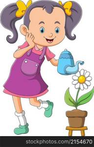 The happy girl is watering the flower in the morning