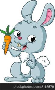 The happy rabbit is showing the small carrot