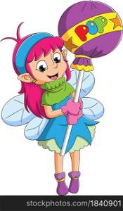 The little fairy girl is holding the big lollipop