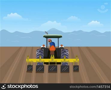 The man is driving tractor. In order to plow the soil in the field. Have a blue sky background