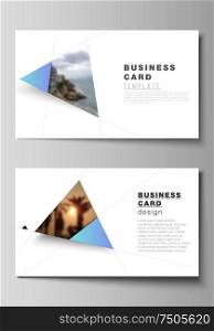 The minimalistic abstract vector layout of two creative business cards design templates. Creative modern background with blue triangles and triangular shapes. Simple design decoration. The minimalistic abstract vector layout of two creative business cards design templates. Creative modern background with blue triangles and triangular shapes. Simple design decoration.