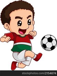 The soccer boy is playing and kicking the ball hardly