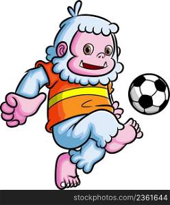 The sporty yeti playing the football and kicking the ball