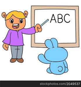 the teacher was in front of the class teaching to read the alphabet