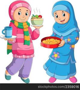 The two girls is serving the delicious food for fasting break