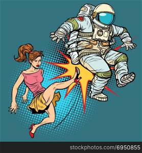The woman kicks an astronaut family quarrel. Pop art retro vector illustration comic cartoon kitsch drawing. The woman kicks an astronaut family quarrel