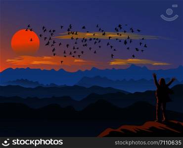 The woman stood up and showed his hands on the top of the mountain happily. There are mountains and sunset background