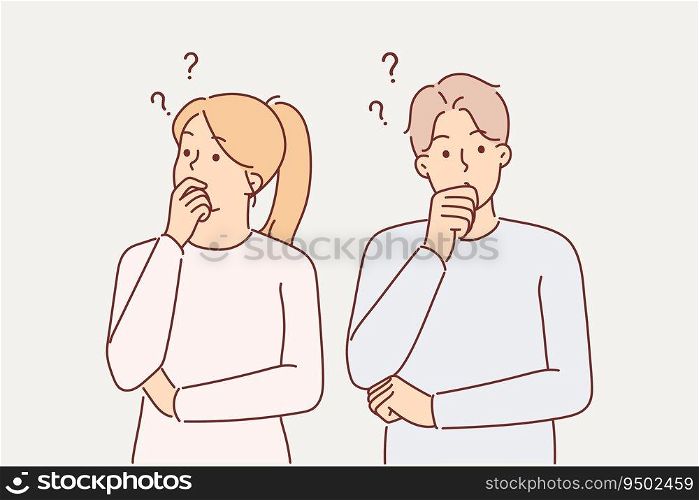 Thoughtful couple touches chins in embarrassment when pondering important question or showing indecision. Thoughtful man and woman choosing solution for relationship problem that has arisen. Thoughtful couple touches their chins in embarrassment when pondering important question
