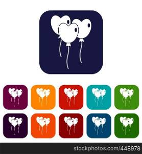 Three balloons in the shape of heart icons set vector illustration in flat style In colors red, blue, green and other. Three balloons in the shape of heart icons set