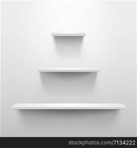 Three shelves on the wall with light and shadow in empty white room. Pyramid or tree shape