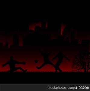 three youths playing football against a city skyline with a red glow