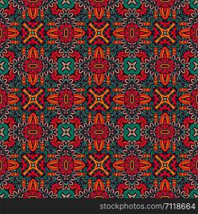 Tiled ethnic pattern for fabric. Abstract geometric mosaic vintage seamless pattern patchwork ornamental.. Abstract colorful geometric ethnic seamless pattern ornamental