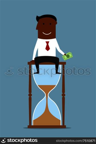 Time is money business concept. Cheerful accomplished businessman sitting on the top of hourglass and holding dollar bills in hand . Businessman sitting with money on hourglass